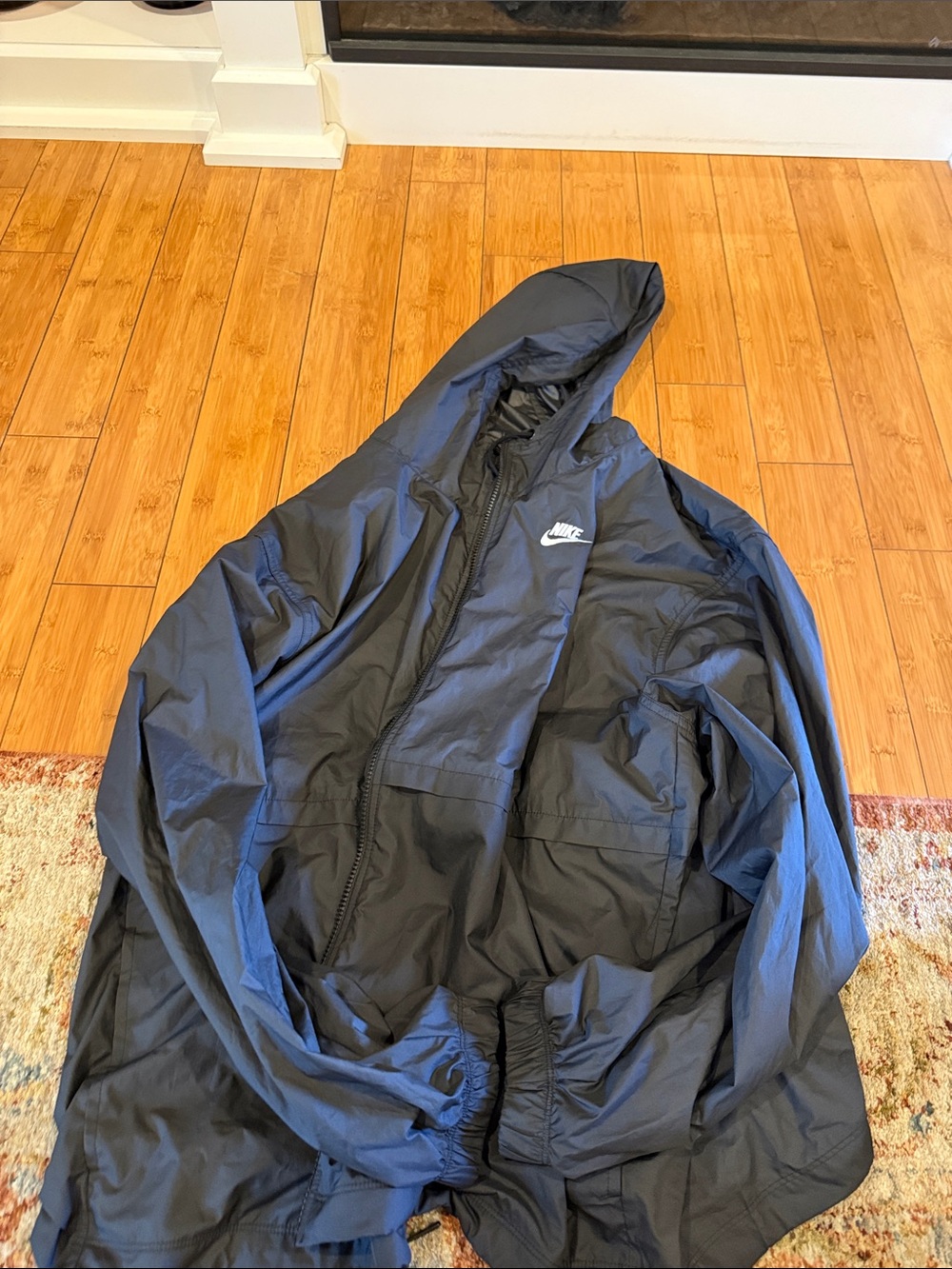 Nike Black Hooded Windbreaker with White Swoosh